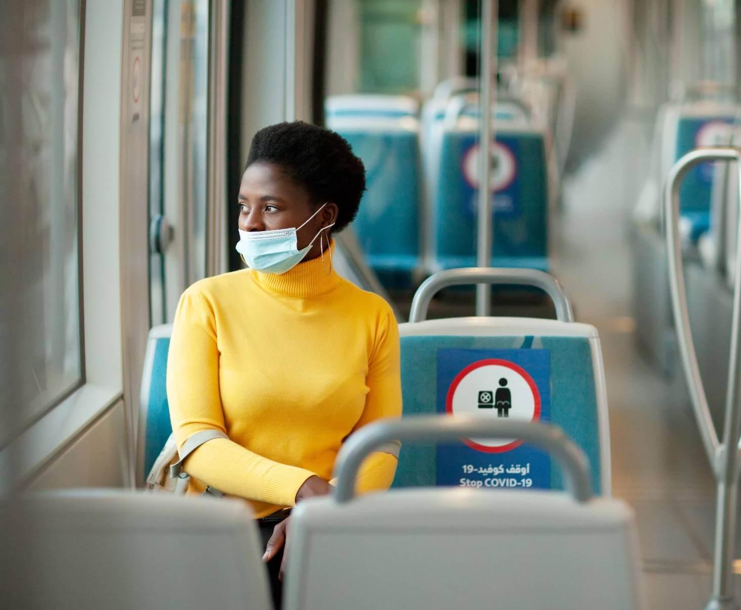 Masked Woman on Public Transit